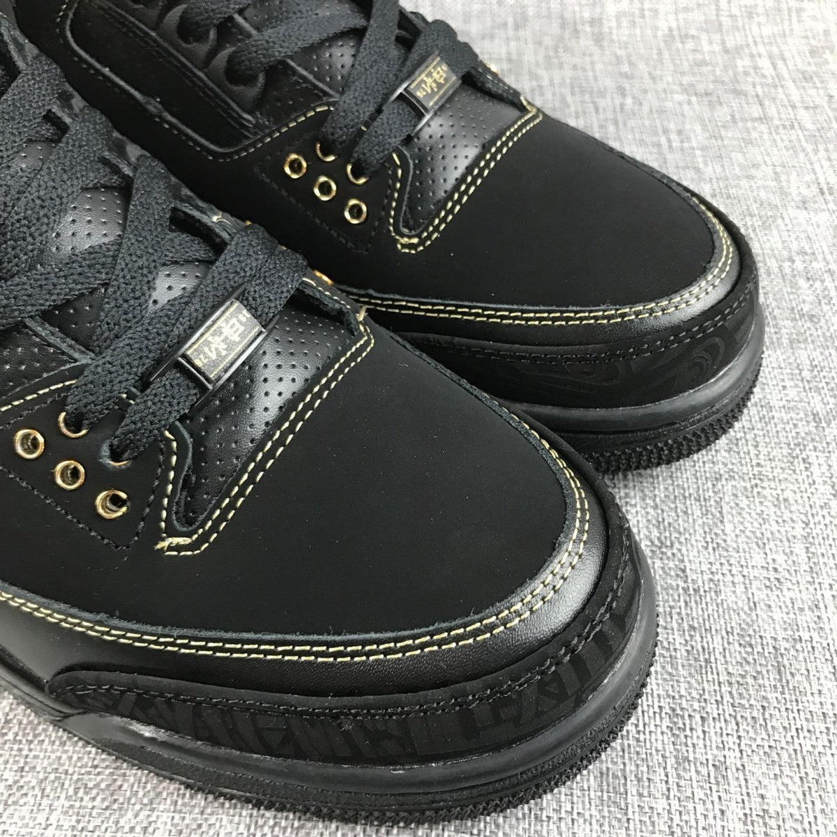 Air Jordan 3 BHM High-Top Sneakers in Black and Metallic Gold - product image from the listing.