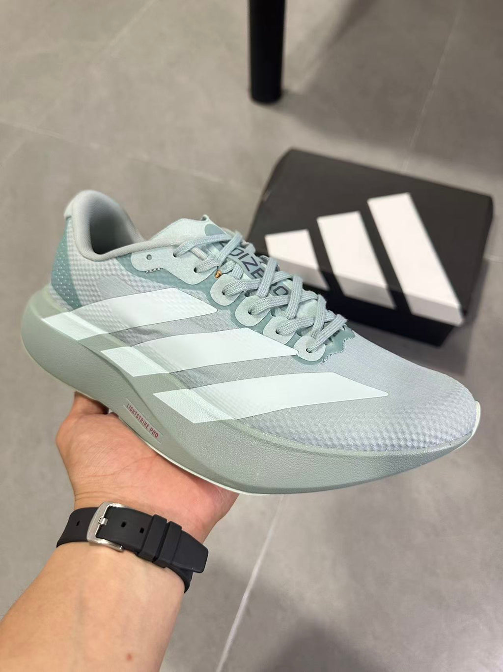 Adidas Lightstrike Pro Running Shoes, in Pale Green - product image from the listing.