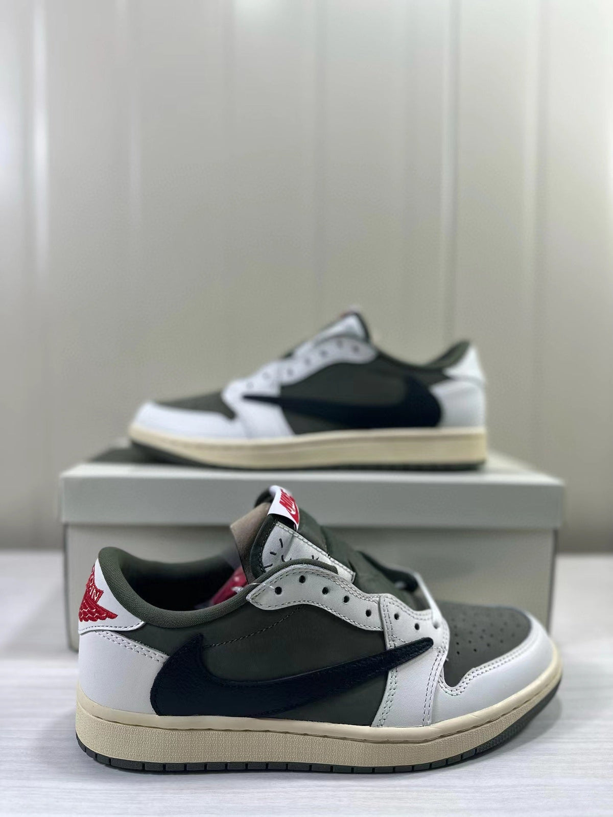 Air Jordan 1 Low OG DM7866-200 Sneakers - product image from the listing.