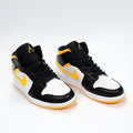 Jordan 1 High Sneakers in Black Yellow White CV5276-107 - product image from the listing.