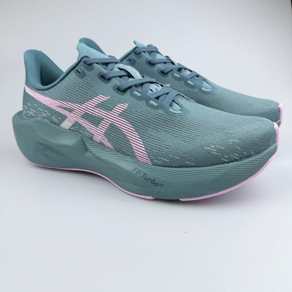 ASICS Gel-Nimbus 27 Running Shoes in Blue Pink 1012C765-001 - product image from the listing.