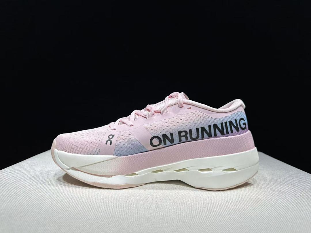 Pink and Blue On Cloudboom Max Running Shoes - product image from the listing.