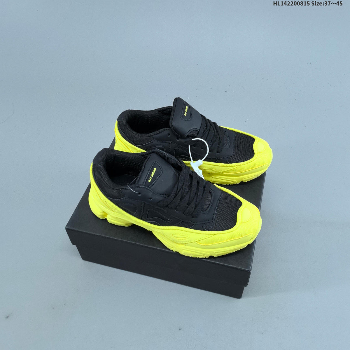 Raf Simons x adidas Ozweego III Retro Sneakers for Running - product image from the listing.