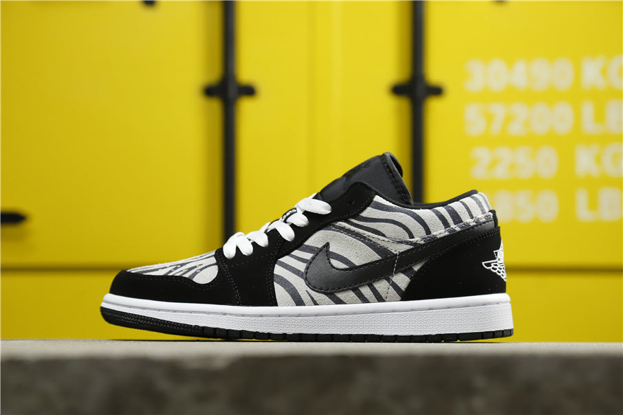 Air Jordan 1 Mid Zebra Print Sneakers Black White - product image from the listing.