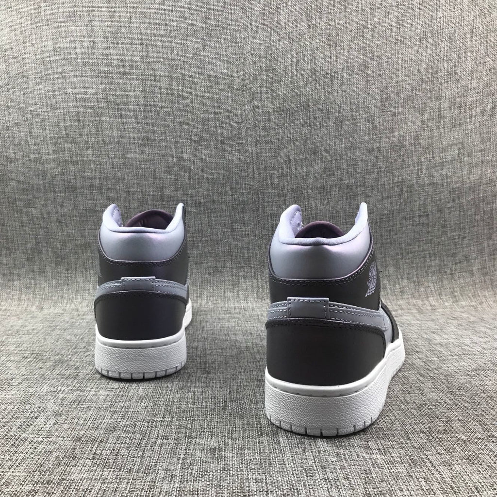 Jordan 1 Mid Sneakers in Purple AV5174-400 - product image from the listing.