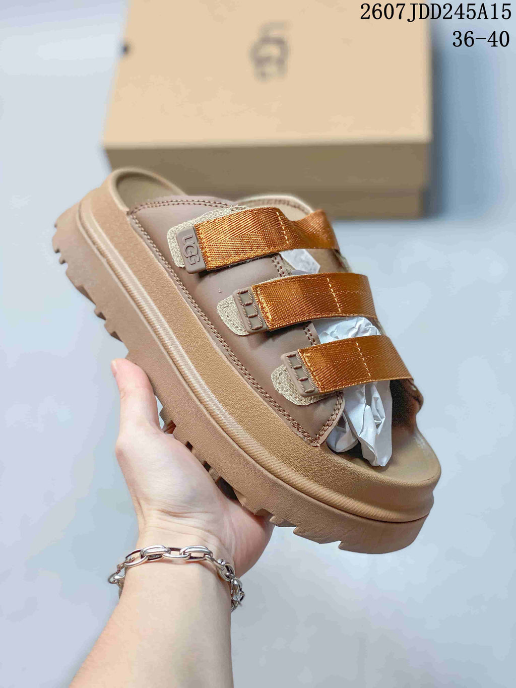 GoldenGlow Slide Sandals for Women by UGG - product image from the listing.