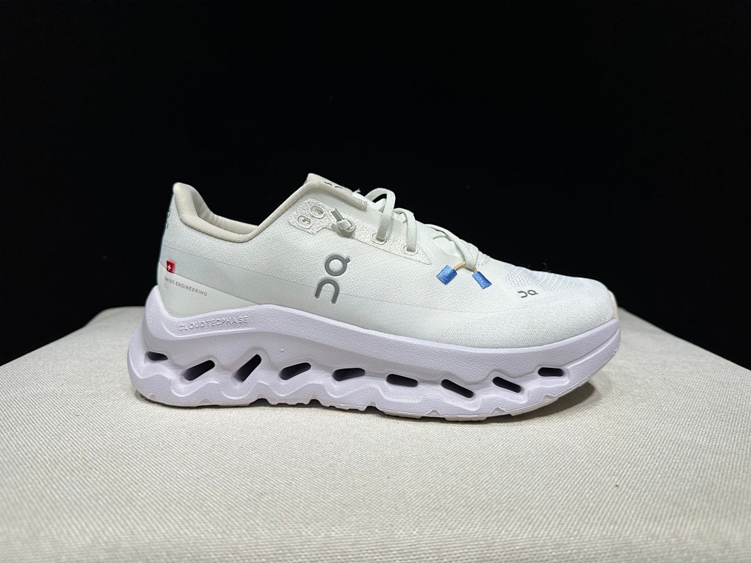 On Cloudtilt Trainers in White and Lavender - product image from the listing.