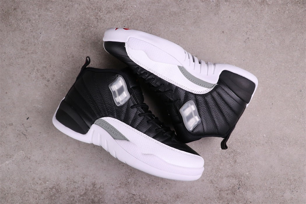 Air Jordan 12 Reverse Taxi Black White 130690-001 - product image from the listing.