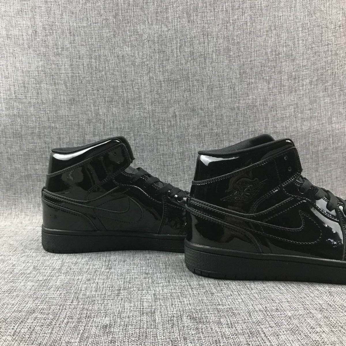 Black Patent Sneakers - Air Jordan 1 Mid BQ6472-002 - product image from the listing.