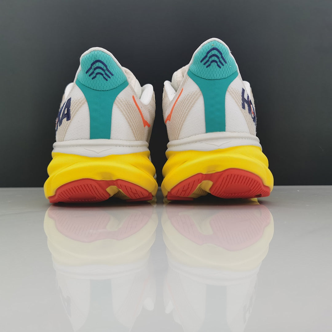 Cream and Yellow HOKA Clifton 9 Running Shoes - product image from the listing.