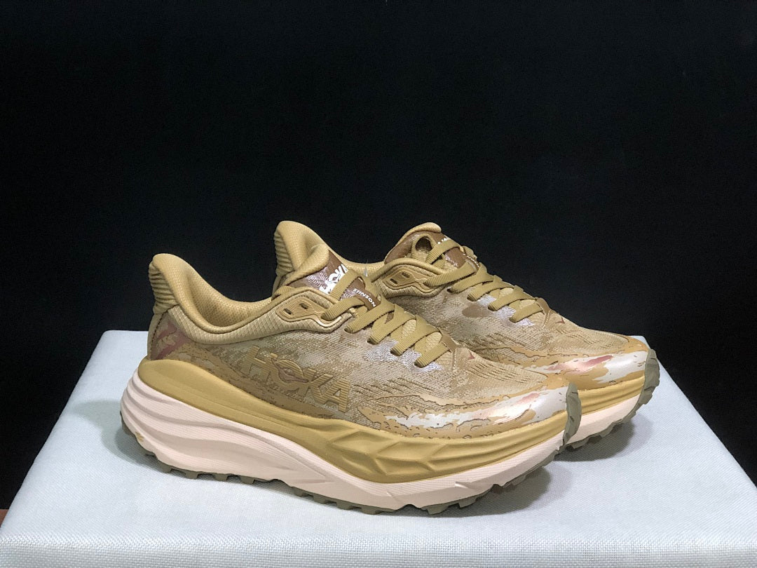HOKA Stinson 7 Trail Shoes for Running, Sand Camo - product image from the listing.