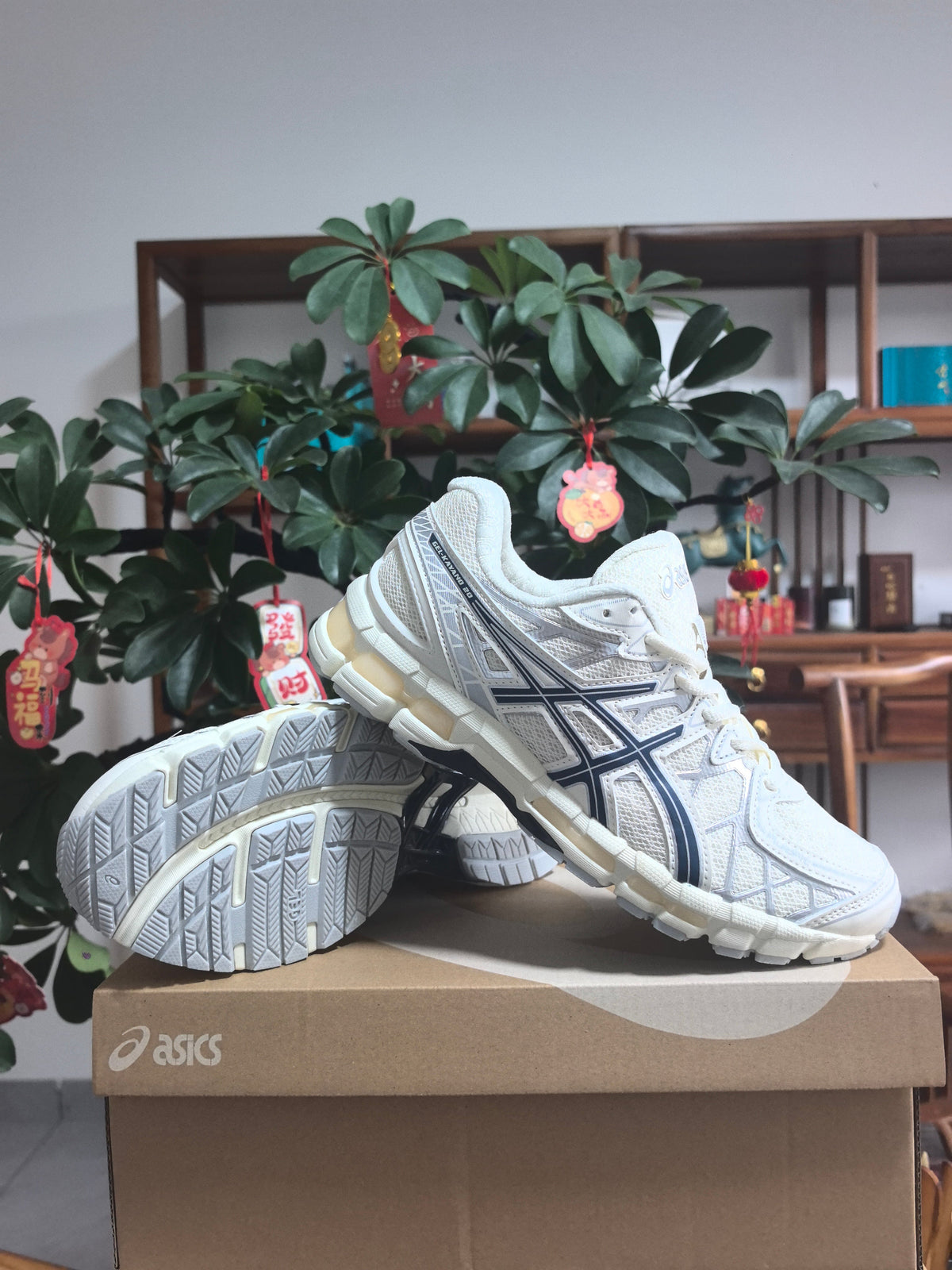 ASICS GEL-NANDI 9 Sneakers in Cream and Blue - product image from the listing.