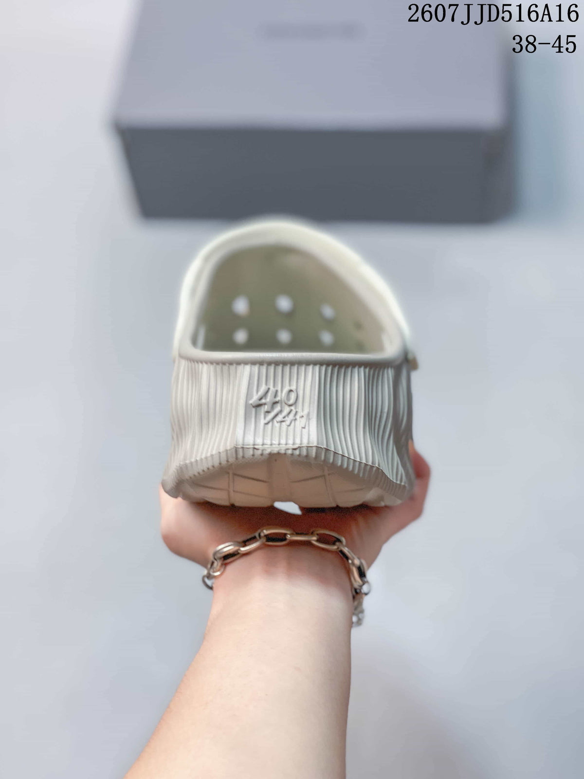 Wave-Textured Closed-Toe Clogs Beige Style 2607JJD516A16 by Balenciaga - product image from the listing.
