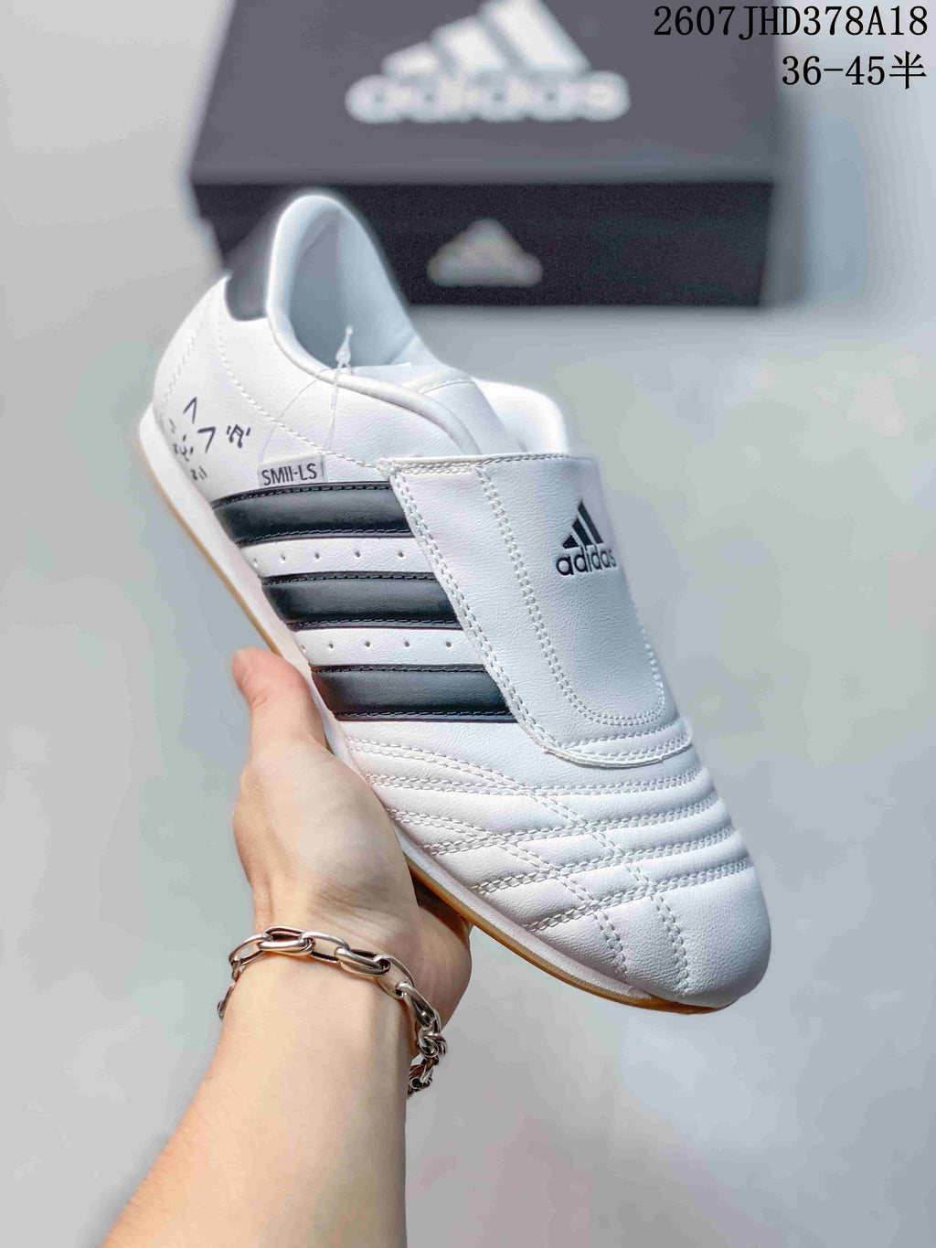 adidas Taekwondo SMIL-LS Sneakers in White Black 2607JHD378A18 - product image from the listing.