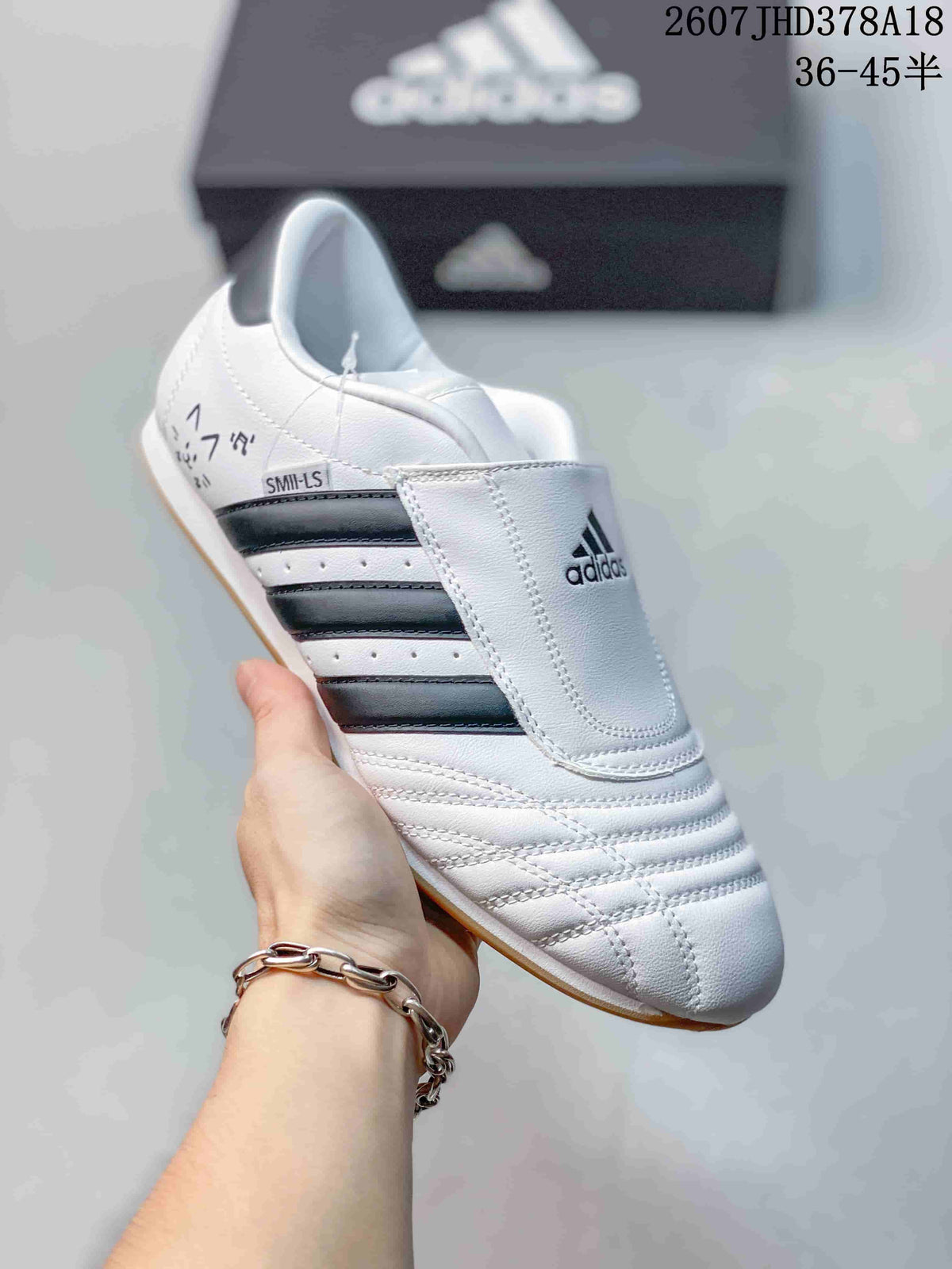 adidas Taekwondo SMIL-LS Sneakers in White Black 2607JHD378A18 - product image from the listing.