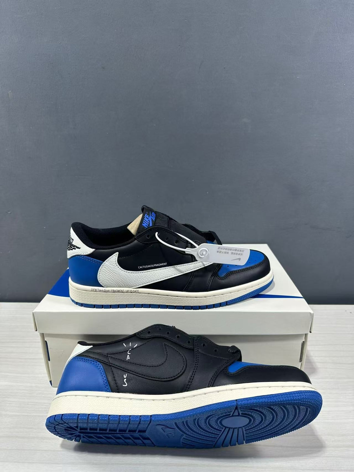 Air Jordan 1 Low Travis Scott Fragment Black Blue Sneakers - product image from the listing.