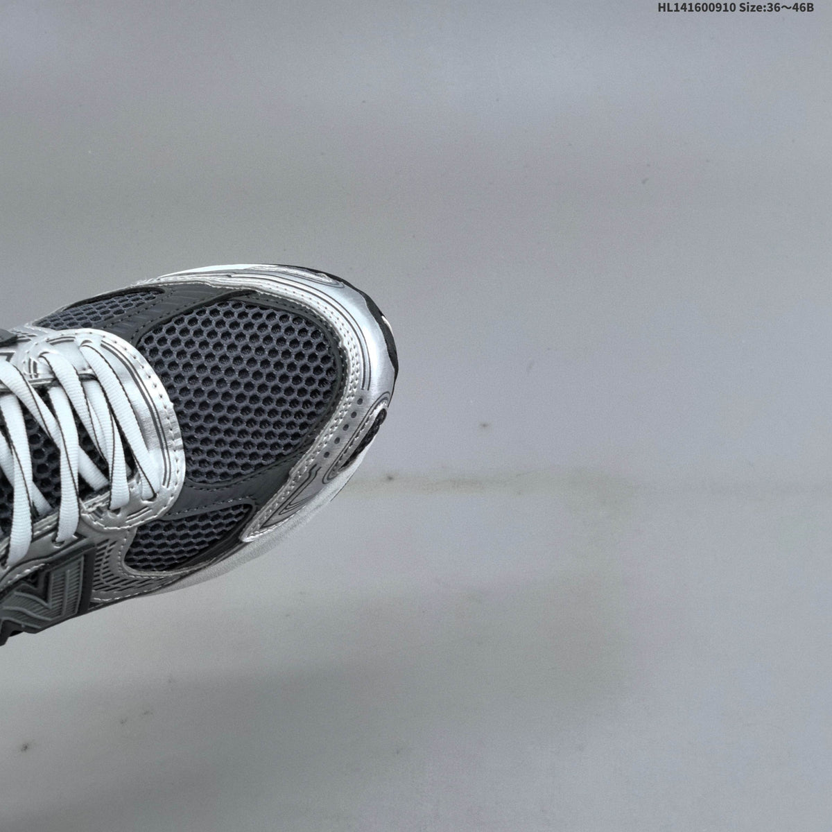 Silver and Charcoal New Balance 2010 Sneakers - product image from the listing.