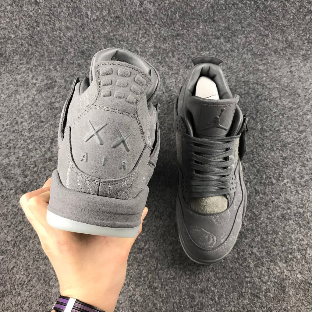 Grey Jordan 4 KAWS Sample High-Top Sneakers - product image from the listing.
