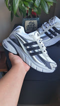 adidas Low-Top Sneakers in White and Grey - product image from the listing.