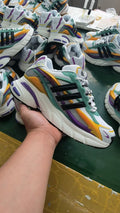 Adidas Ozweego Sneakers in White, Teal, in Purple and Yellow - product image from the listing.