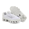 Nike Shox TL Sneakers in White and Grey - product image from the listing.