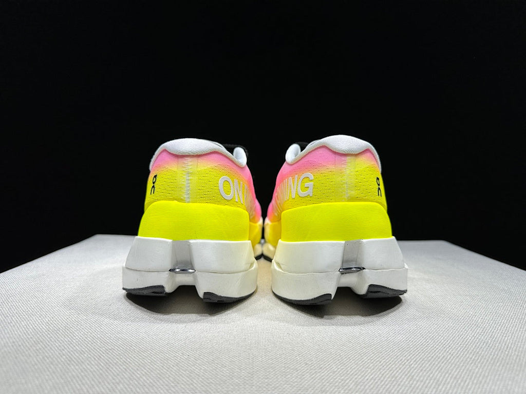 On Cloudboom Max Running Shoes, in White Pink Yellow - product image from the listing.