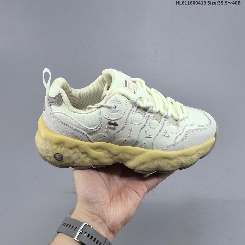 Cream and Charcoal FILA Chunky Sole Sneakers - product image from the listing.