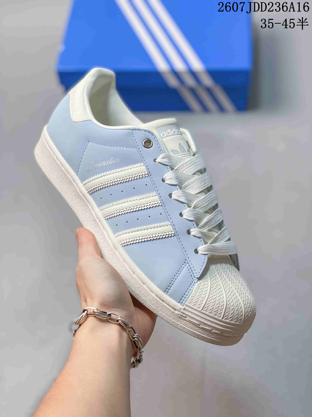 adidas Superstar Sneakers in Light Blue and White JDD236A16 - product image from the listing.