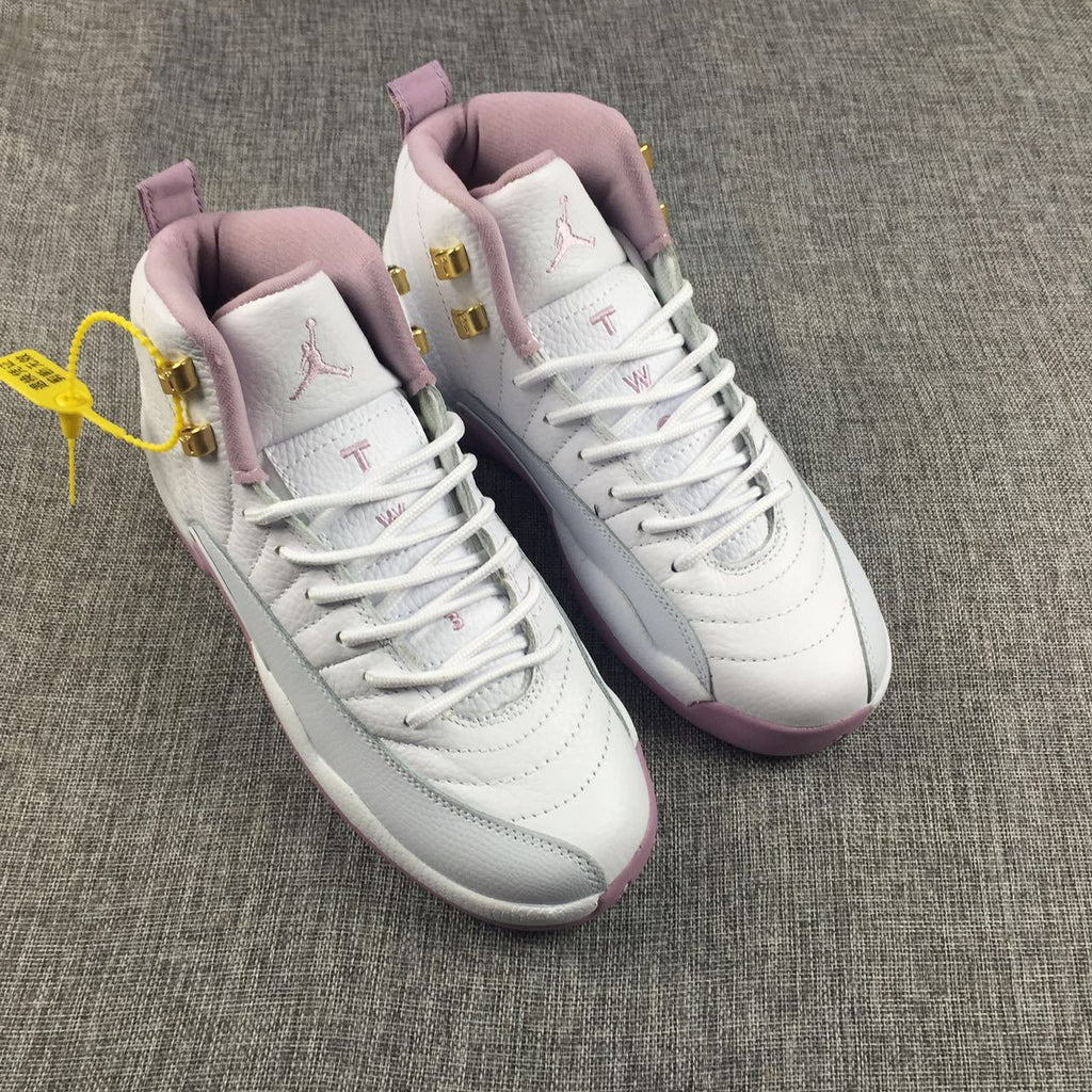 Air Jordan 12 Cherry Blossom Pink Sneakers - product image from the listing.