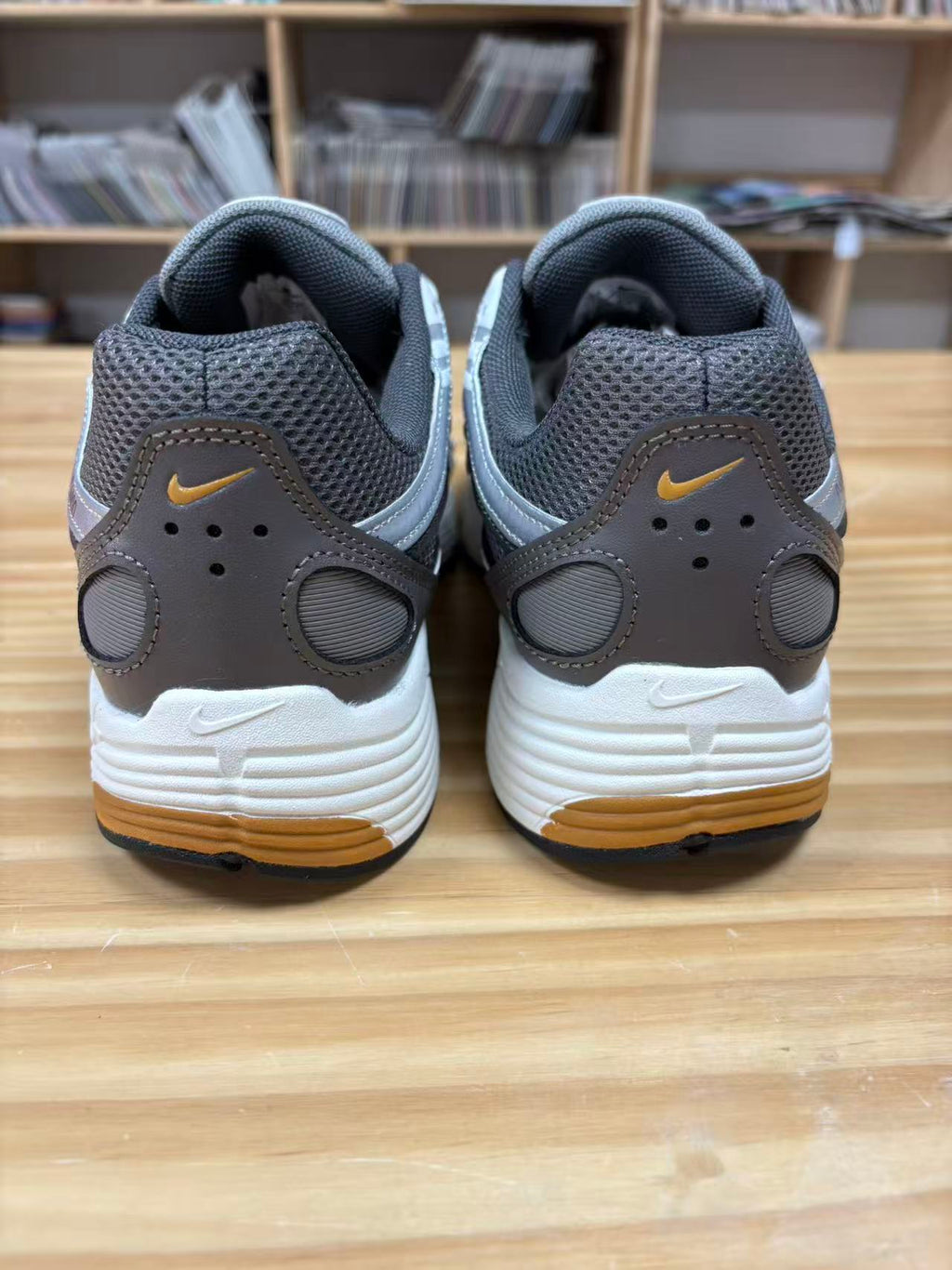 Nike P-6000 Sneakers CD6404-204 in Charcoal and White - product image from the listing.