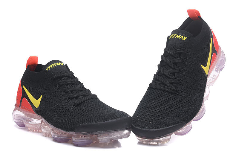 Nike Air VaporMax Flyknit 2 Sneakers in Black and Yellow - product image from the listing.