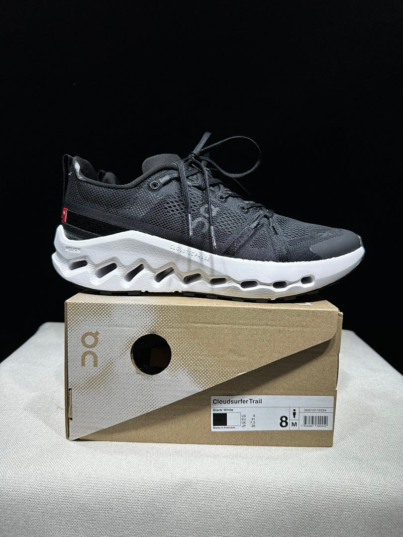 On Cloudsurfer Trail Trail Running Shoes in Black and White - product image from the listing.