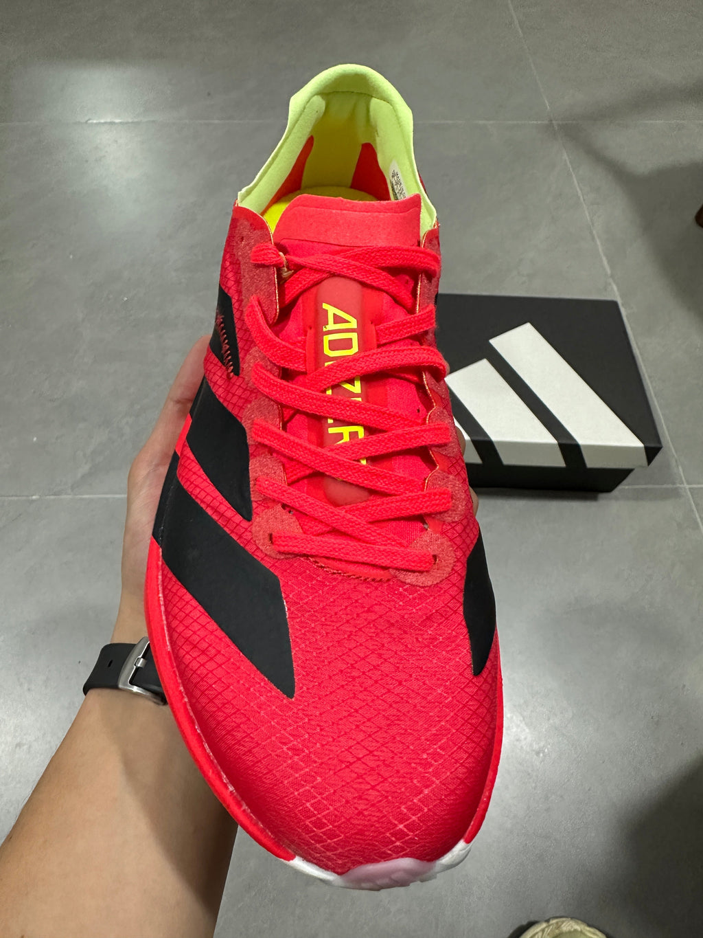 Nike Adizero Running Shoes in Red Black Volt JR6358 - product image from the listing.