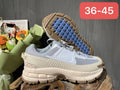 Gray and White Nike F7 Gen 2 Sneakers - product image from the listing.