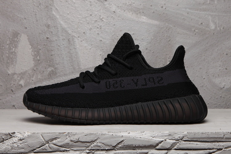 Yeezy 350 V2 Low-Top Sneakers in Black - product image from the listing.