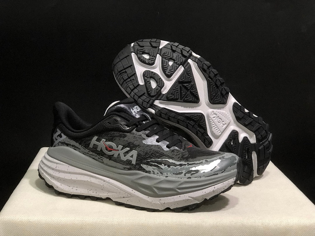 Black and Gray HOKA Stinson 7 Trail Running Shoes - product image from the listing.
