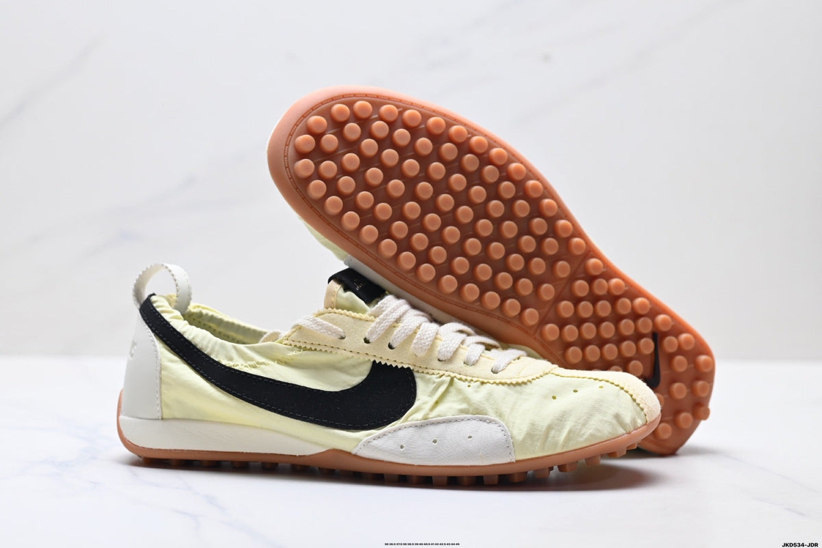 Pale Yellow and Black Nike x Jacquemus Sneakers - product image from the listing.