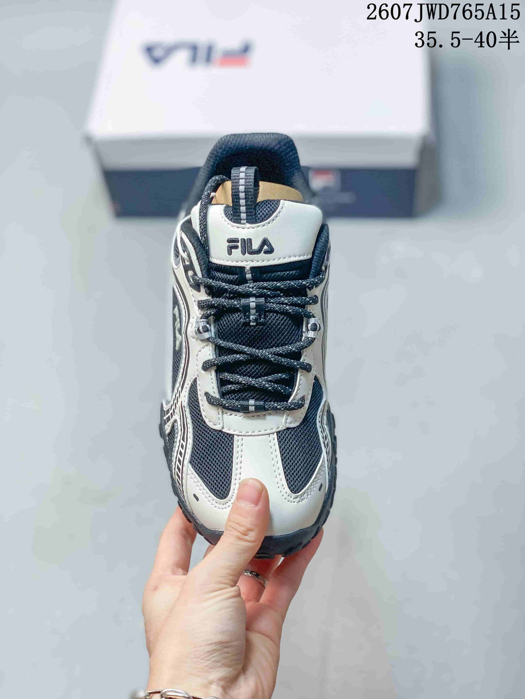 Women's FILA Pebble Low-Top Sneakers Black and White - product image from the listing.