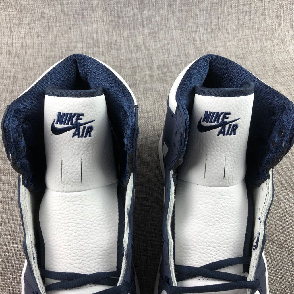Air Jordan 1 Co.JP High Sneakers White Navy Silver DC1788-100 - product image from the listing.
