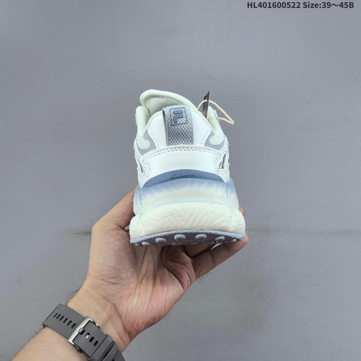 FILA FERN Low-Top Sneakers in White and Blue F12M622118FSP - product image from the listing.