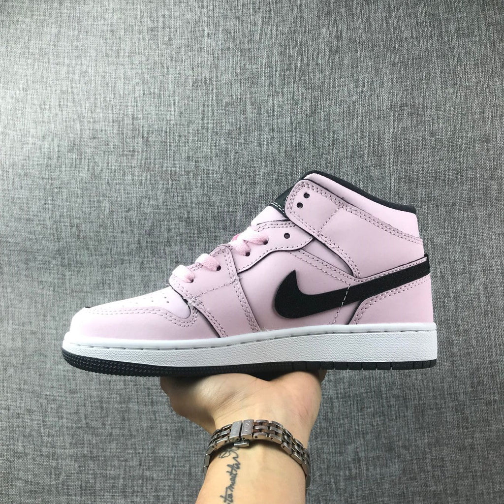 Air Jordan 1 Mid High-Top Sneakers in Pink and Black - product image from the listing.