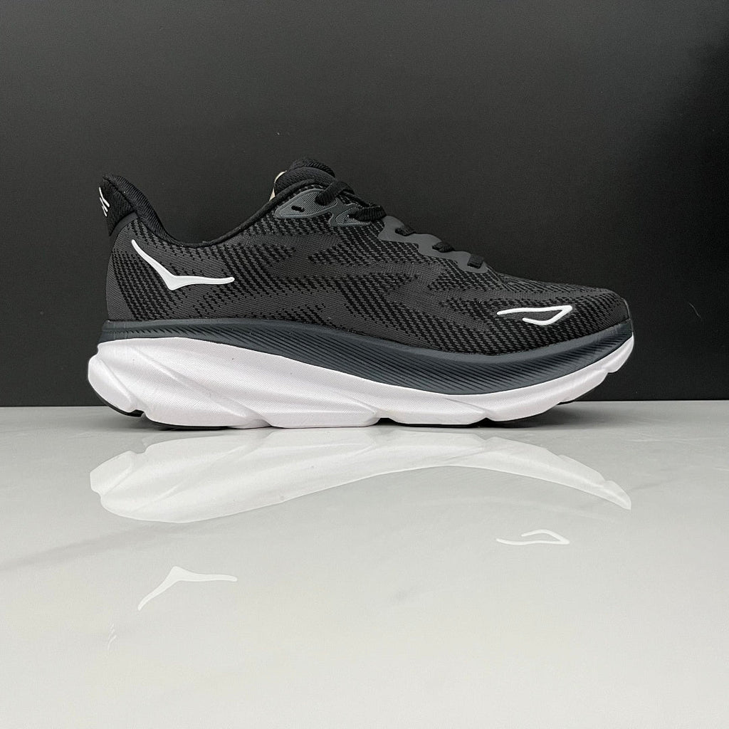 HOKA Clifton 9 Running Shoes in Black and White - product image from the listing.