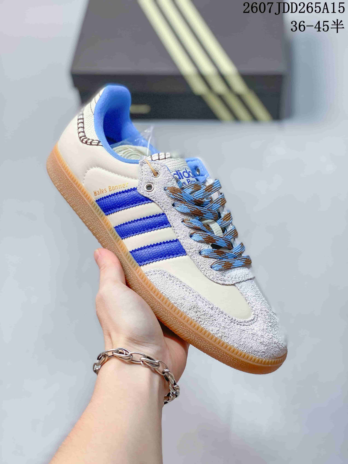adidas Samba Leather Low-Top Sneakers in White/Blue and in Pink - product image from the listing.