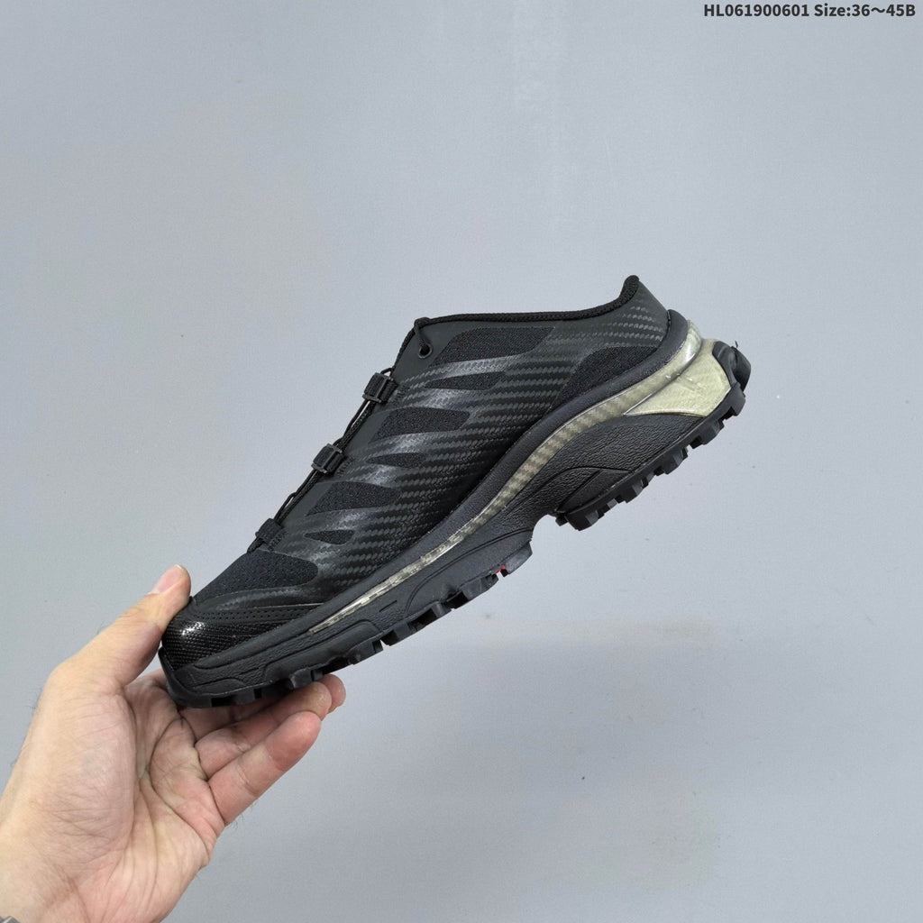 Black and Silver Salomon XT-4 Mule Sneakers - product image from the listing.