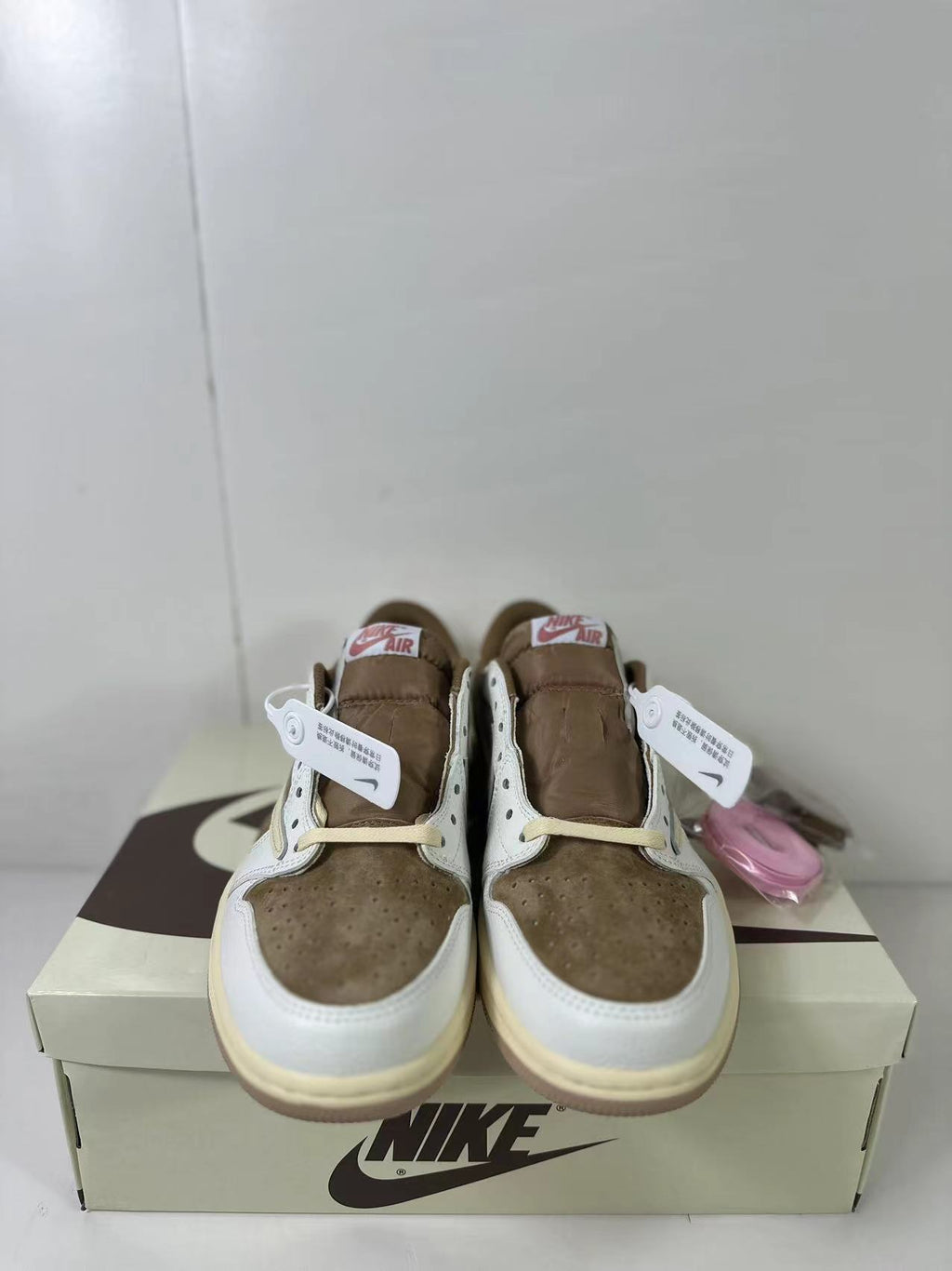 Travis Scott x Air Jordan 1 Low Reverse in Mocha Pink DM7866-106 - product image from the listing.