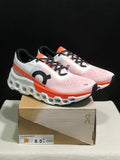 White and Orange On Cloudmonster 2 Running Shoes - product image from the listing.