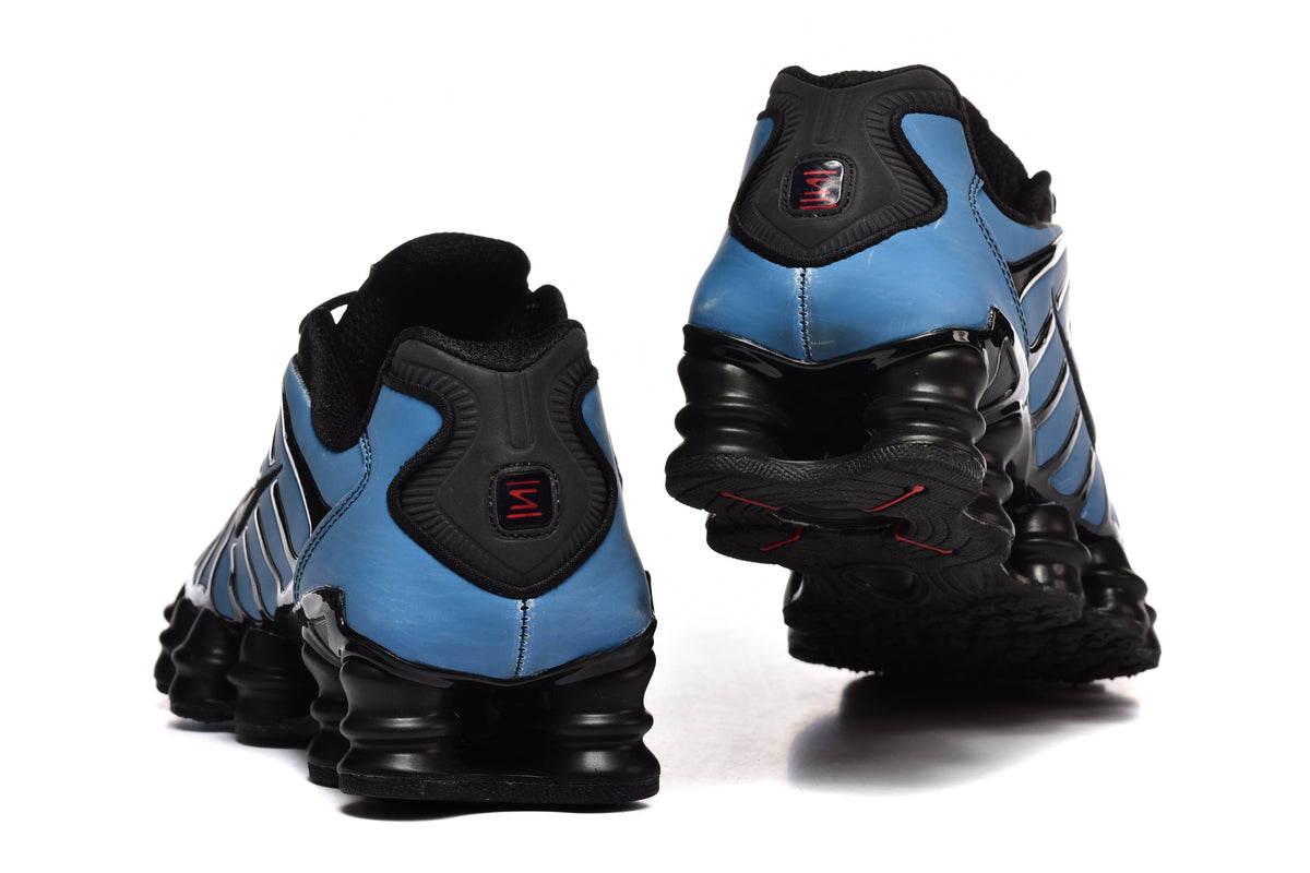 Pink and Black Nike Shox TL Sneakers - product image from the listing.