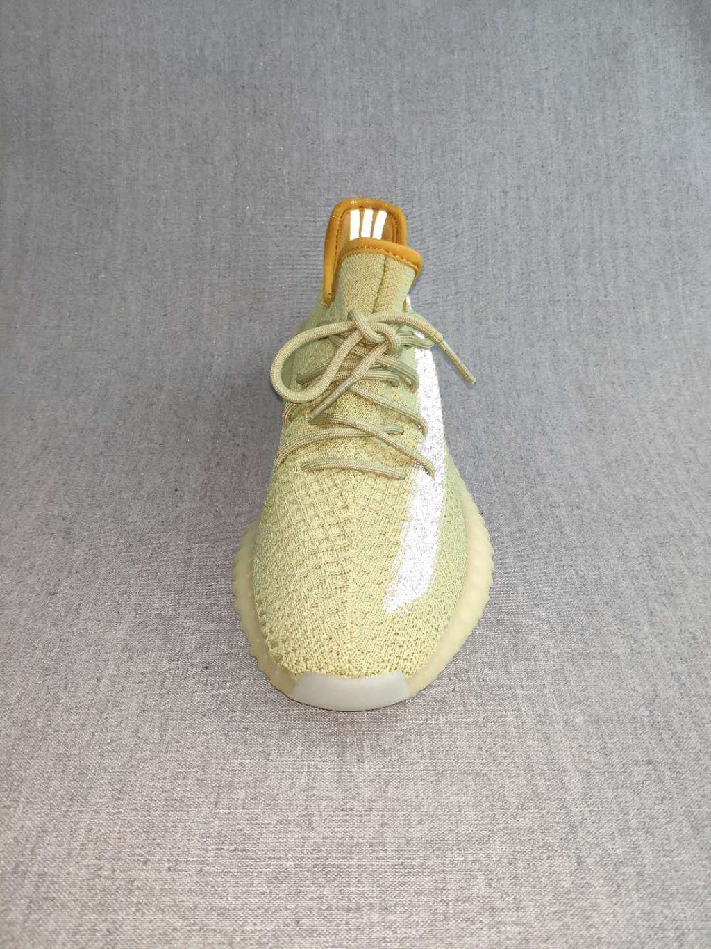 Yeezy 350 V2 Static Reflective Sneakers in Green - product image from the listing.