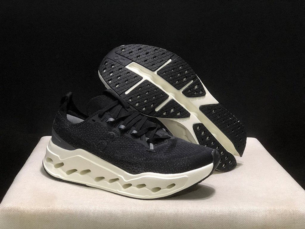 On Cloudsurfer Max Running Sneakers in Black and White - product image from the listing.