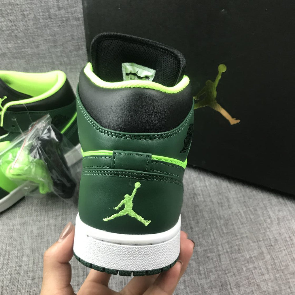 Air Jordan 1 Mid Fluorescent Sneakers in Green 554724-330 - product image from the listing.